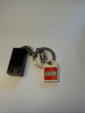 Lego Black Brick Keychain with White and Red Logo Tag